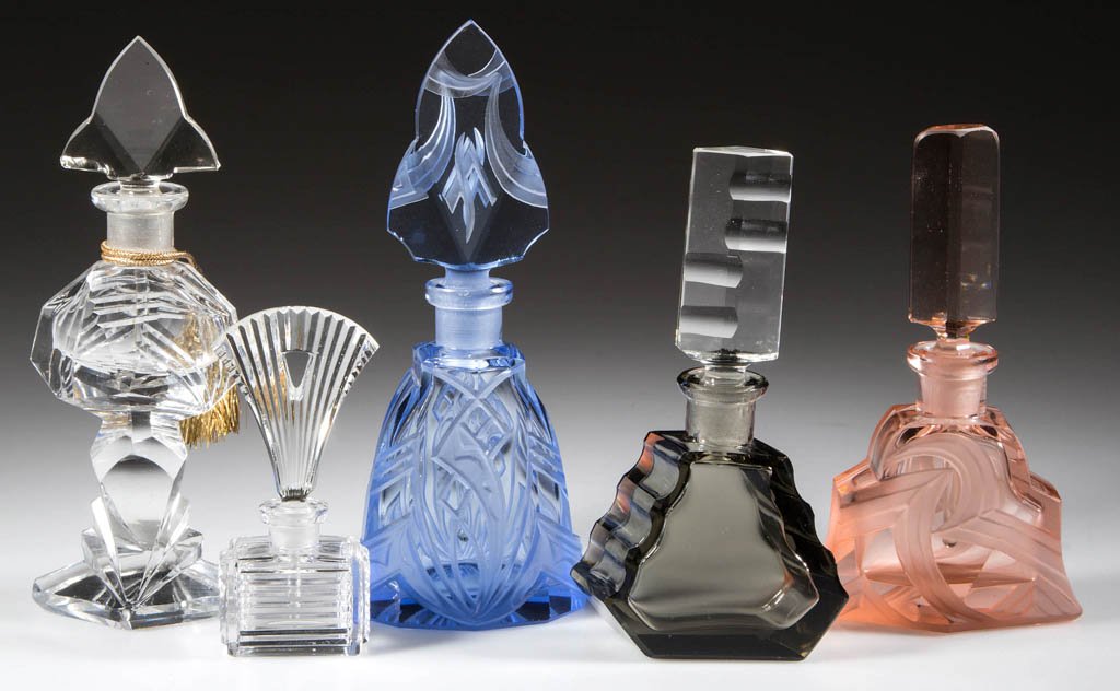 CZECHOSLOVAKIAN GLASS PERFUME BOTTLES, LOT OF FIVE: CZECHOSLOVAKIAN GLASS PERFUME BOTTLES, LOT OF FIVE, comprising one pink and one blue Art Deco style with frosted highlights, two colorless, and one smoke, each with original stopper and acid signature