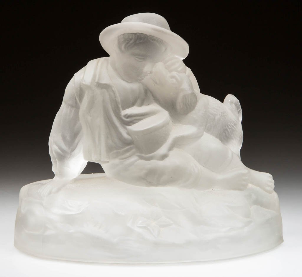 GILLINDER CENTENNIAL EXHIBITION BOY AND DOG STATUETTE: GILLINDER CENTENNIAL EXHIBITION BOY AND DOG STATUETTE, colorless and frosted, lightly embossed "GILLINDER & SONS / CENTENNIAL EXHIBITION 1876" under the base. Gillinder & Sons, Philadelphia, PA. Circa