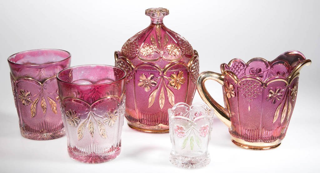 DOUBLE DAHLIA WITH LENS TABLE ARTICLES, LOT OF FIVE: DOUBLE DAHLIA WITH LENS TABLE ARTICLES, LOT OF FIVE, colorless, maiden's blush stained, some gilt decoration, comprising a covered sugar, creamer, toothpick holder, and two tumblers. U.S. Glass Co. Ci