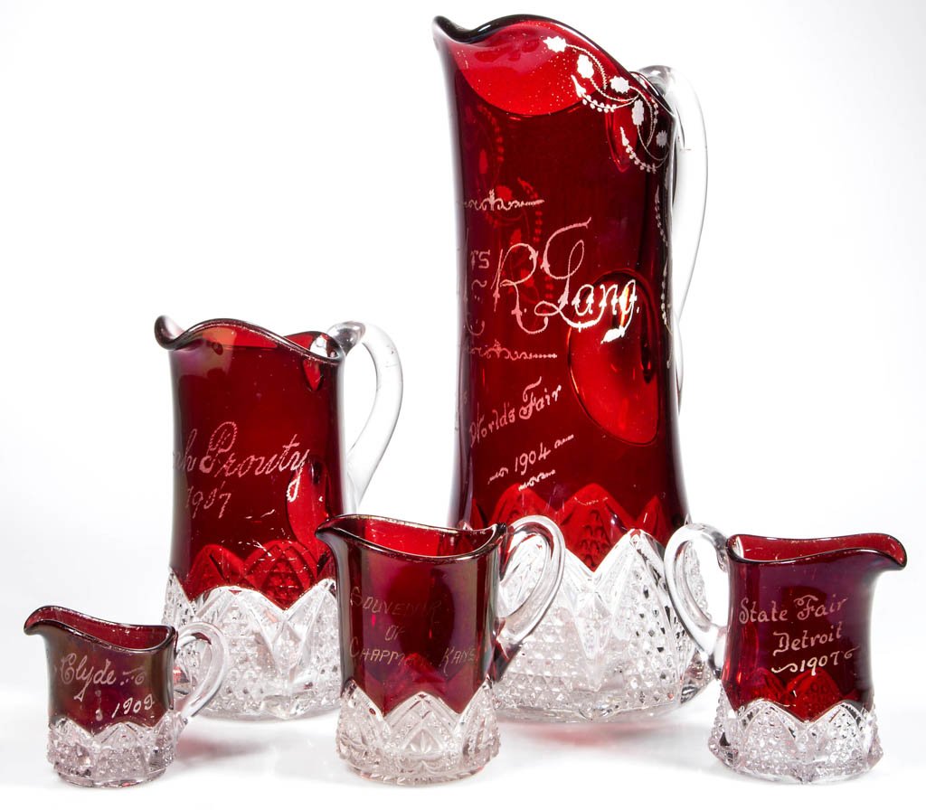 DUNCAN NO. 39 / BUTTON ARCHES - RUBY-STAINED ARTICLES,: DUNCAN NO. 39 / BUTTON ARCHES - RUBY-STAINED ARTICLES, LOT OF FIVE, colorless, each with souvenir engravings, the pitcher with engravings regarding 1904 World's Fair. Geo. Duncan & Sons Co. / Duncan a