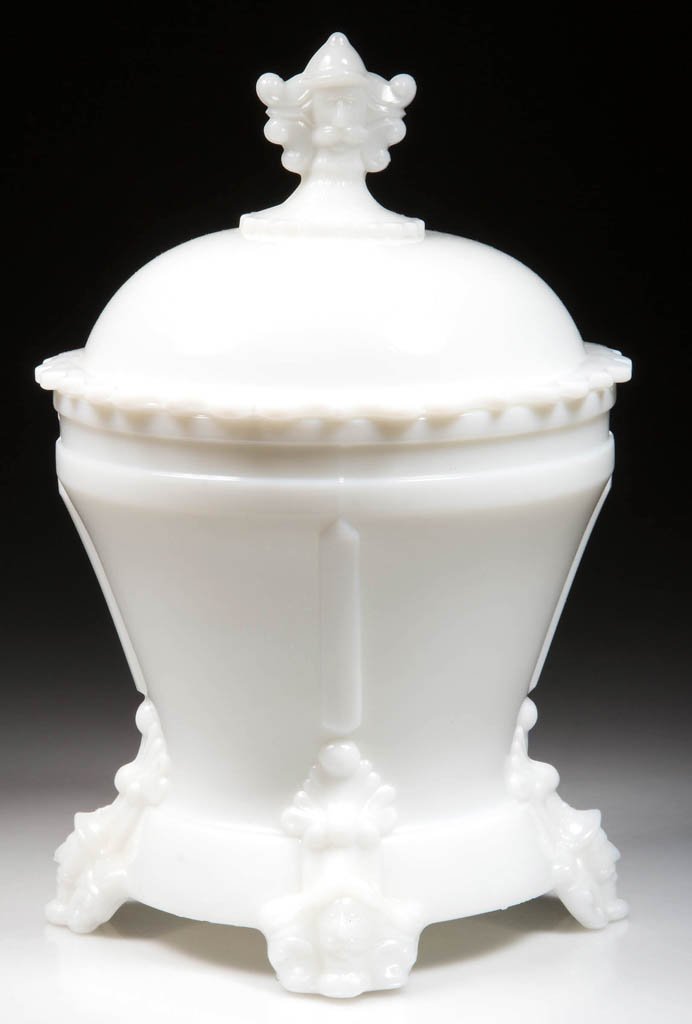 HOBBS NO. 76 / VIKING COVERED SUGAR BOWL: HOBBS NO. 76 / VIKING COVERED SUGAR BOWL, opaque white/milk glass, raised on four feet, cover with bust finial. Hobbs, Brockunier & Co., Wheeling, WV. Pattern introduced 1876. 8" HOA. Provenance: Prop