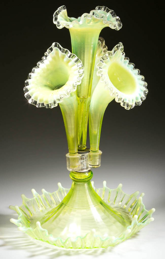 L. G. WRIGHT / FENTON PRESSED GLASS EPERGNE: L. G. WRIGHT / FENTON PRESSED GLASS EPERGNE, vaseline (uranium) opalescent, crimped- and ruffled-rim bowl fitted with a central trumpet-form vase surrounded by three jack-in-the-pulpit vases. Fenton A