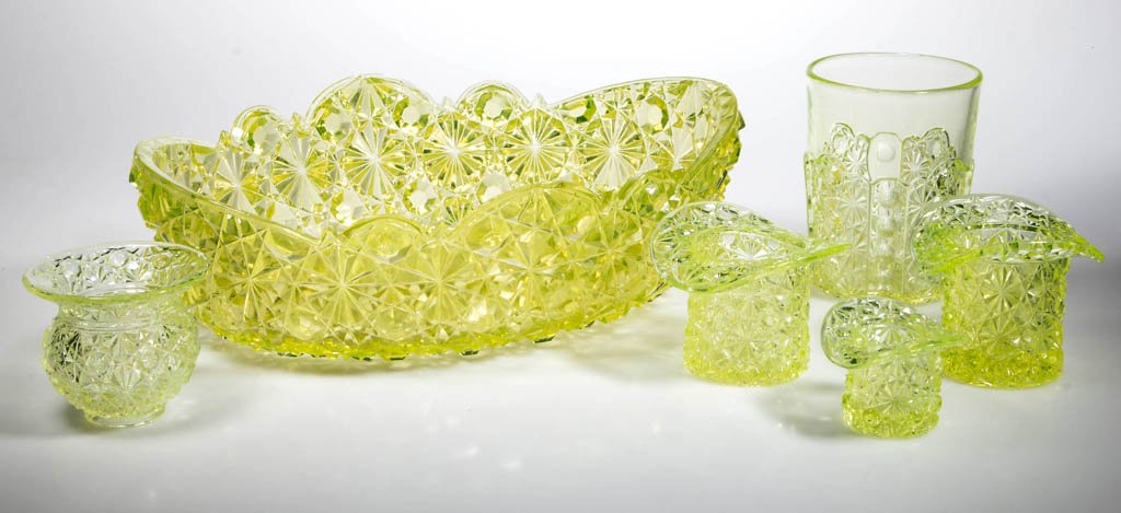 ASSORTED DAISY AND BUTTON TABLE ARTICLES, LOT OF SIX: ASSORTED DAISY AND BUTTON TABLE ARTICLES, LOT OF SIX, vaseline (uranium), including three hat toothpick holders. Fourth quarter 19th century. Oval bowl 11" D. Provenance: From a Connecticut private co