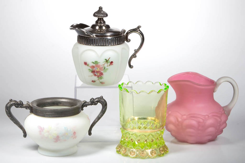 ASSORTED EAPG AND OTHER TABLE ARTICLES, LOT OF FOUR: ASSORTED EAPG AND OTHER TABLE ARTICLES, LOT OF FOUR, including a vaseline (uranium) Riverside National/Petticoat spooner and a pink satin Guttate creamer. Fourth quarter 19th century. 3 1/4" to 5" HOA