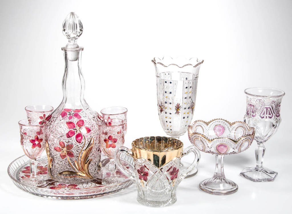ASSORTED STAINED EAPG TABLE ARTICLES, LOT OF TEN: ASSORTED STAINED EAPG TABLE ARTICLES, LOT OF TEN, colorless, maiden's blush stain, some gilt decoration, including a Daisy and Button with Narcissus five-piece wine set and tray, and a Reverse 44 gobl