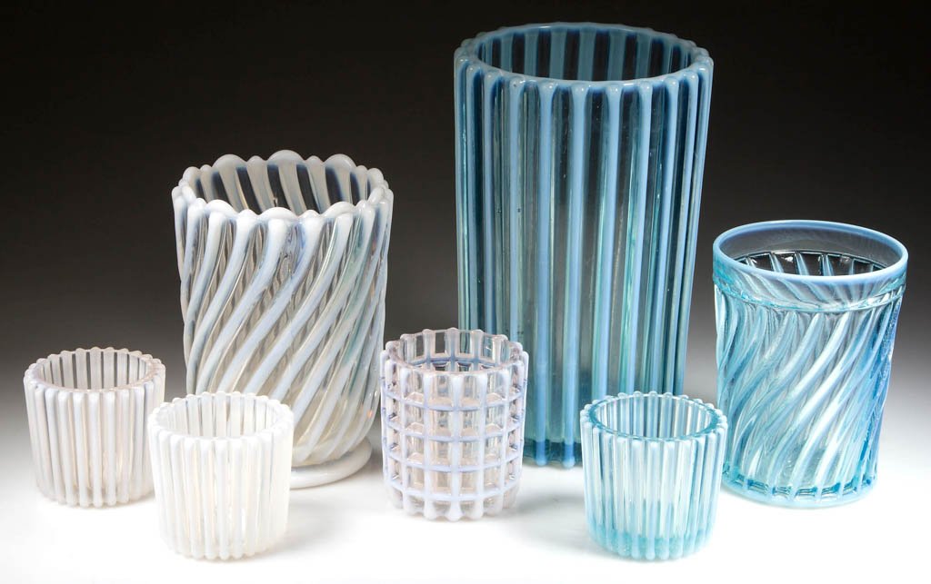 A. J. BEATTY OPALESCENT GLASS TABLE ARTICLES, LOT OF: A. J. BEATTY OPALESCENT GLASS TABLE ARTICLES, LOT OF SEVEN, blue and colorless opalescent, comprising a celery vase, a spooner, a tumbler, and four toothpick holders. A. J. Beatty & Sons. Circa 1888.