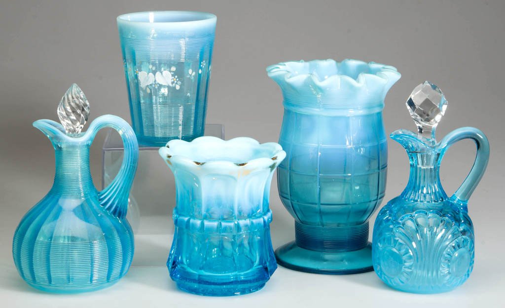 ASSORTED VICTORIAN TABLE ARTICLES, LOT OF FIVE: ASSORTED VICTORIAN TABLE ARTICLES, LOT OF FIVE, blue opalescent, comprising an Alaska tumbler, Block celery vase, Jackson cruet with replaced stopper, Regal Northwood spooner, and Tokyo cruet with pos
