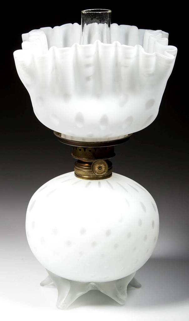 RAINDROP AIR-TRAP MOTHER-OF-PEARL SATIN MINIATURE OIL: RAINDROP AIR-TRAP MOTHER-OF-PEARL SATIN MINIATURE OIL LAMP, cased white, with matching square upturned ruffled-top shade. Base has five colorless frosted applied feet. Period burner marked "E. M & Co.