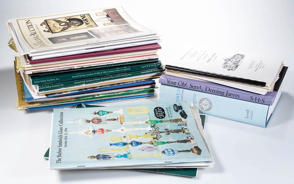 ASSORTED LIGHTING, GLASS AND OTHER REFERENCE VOLUMES: ASSORTED LIGHTING, GLASS AND OTHER REFERENCE VOLUMES AND AUCTION CATALOGS, UNCOUNTED LOT, including "Sandwich A Cape Cod Town" by R. A. Lovell, Jr. Sandwich, hardcover with dust jacket; auction catalo