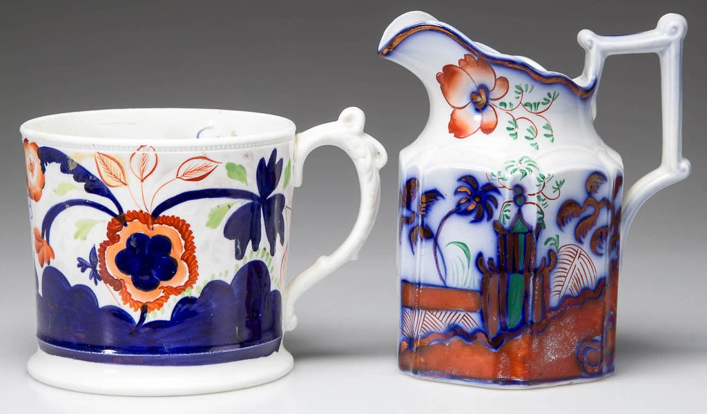 ENGLISH STAFFORDSHIRE POTTERY GAUDY WELSH PITCHER AND: ENGLISH STAFFORDSHIRE POTTERY GAUDY WELSH PITCHER AND MUG OR TANKARD, LOT OF TWO, comprising an ironstone hexagonal, Gothic-style pitcher, with fluted upper edge and bracket-form handle, painted in co