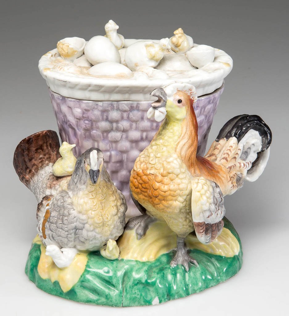 CONTINENTAL PORCELAIN SPILL VASE AND COVER, CHICKEN: CONTINENTAL PORCELAIN SPILL VASE AND COVER, CHICKEN FAMILY, tapering oval basket-weave-molded spill vase or vessel, attached to a mound base, with a hen, rooster and their chicks on the molded green-p
