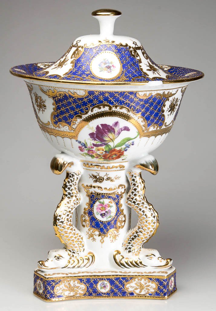 ASIAN "KPM" PORCELAIN COVERED PRESENTATION BOWL ON: ASIAN "KPM" PORCELAIN COVERED PRESENTATION BOWL ON STAND, round with high-domed cover, on an integral stand supported by three dolphin tails surrounding the cylindrical main support, atop the triangul