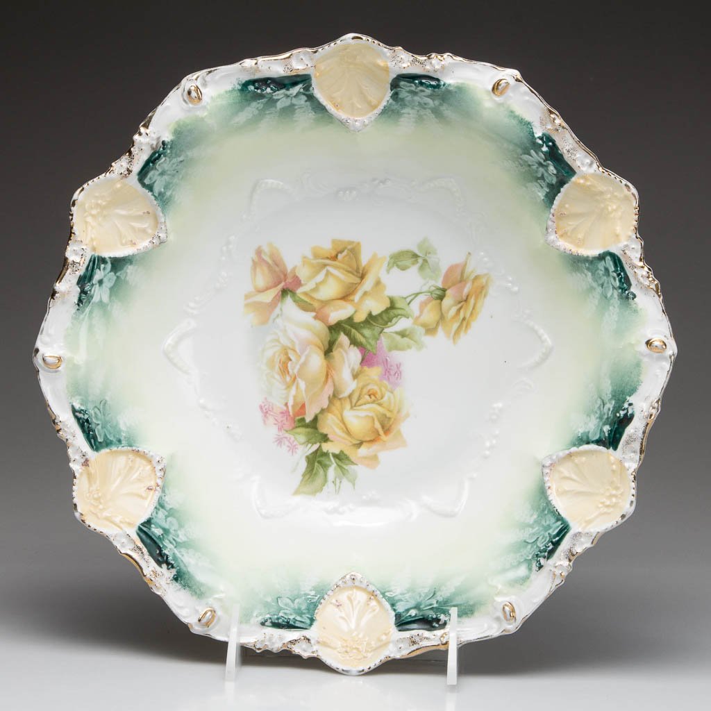 GERMAN R.S. PRUSSIA PORCELAIN SERVING BOWL: GERMAN R.S. PRUSSIA PORCELAIN SERVING BOWL, mold #37 shape, with foliate and dotted belt rim, painted with gold and gold-dust, centering a spray of yellow and white roses in a bouquet, wreath star and