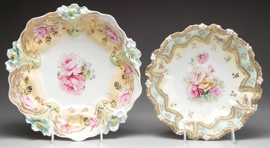 GERMAN R.S. PRUSSIA PORCELAIN SERVING BOWLS, LOT OF TWO: GERMAN R.S. PRUSSIA PORCELAIN SERVING BOWLS, LOT OF TWO, German-market mold #291 and mold #23 shapes, with foliate-molded rims, painted with gold and gold-dust, centering sprays of flowers. The first 
