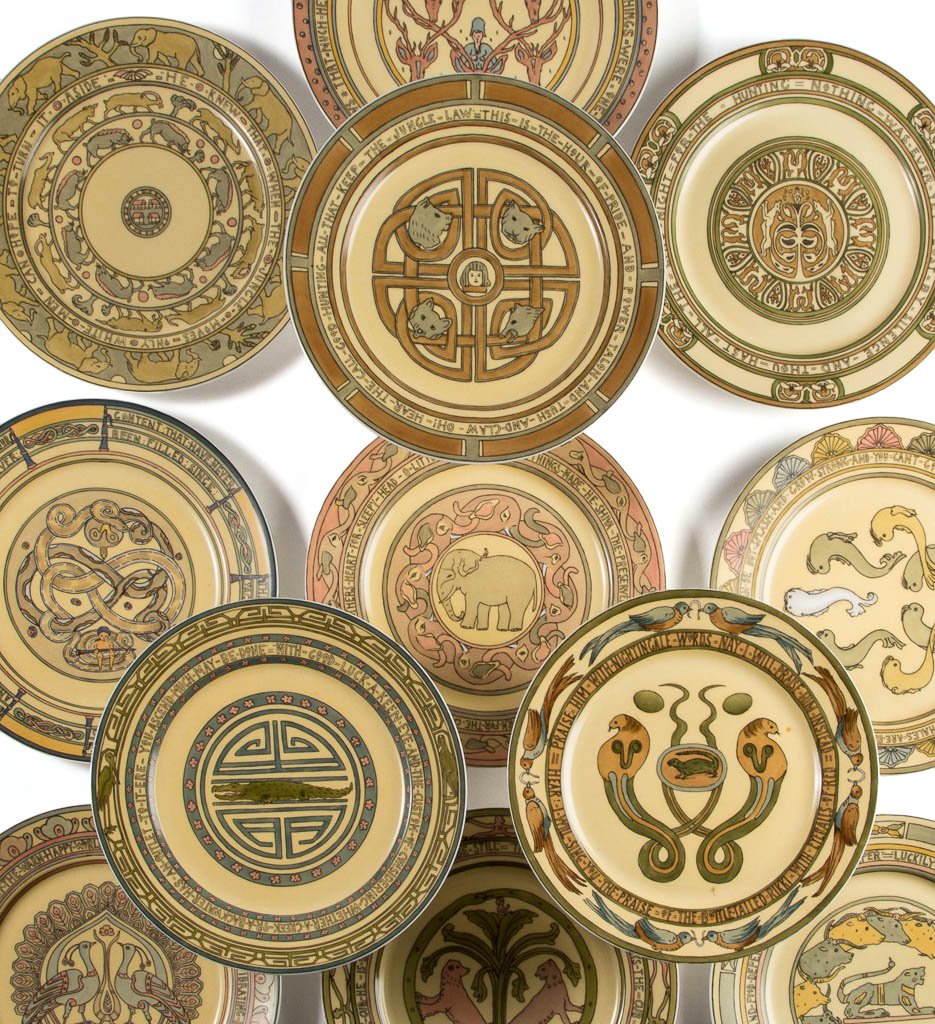 FRENCH LIMOGES PORCELAIN MARY BACON JONES (1868-1924): FRENCH LIMOGES PORCELAIN MARY BACON JONES (1868-1924) "JUNGLE FOLK" PLATES, SET OF 12, comprising a rare and complete set of plates designed by Jones, and printed for her by the firm of William Geurin