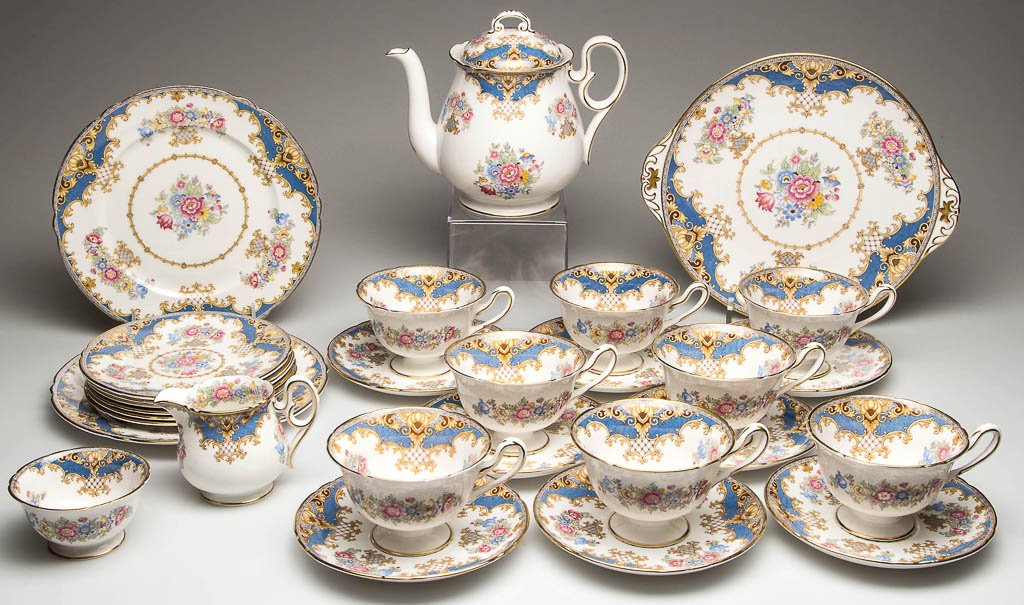 ENGLISH SHELLEY CHINA "GAINSBOROUGH" SHAPE "SHERATON: ENGLISH SHELLEY CHINA "GAINSBOROUGH" SHAPE "SHERATON BLUE" PATTERN TABLE ARTICLES, LOT OF 28, white, with printed polychrome pattern, including a teapot, a creamer, an open sugar, a handled serving pl