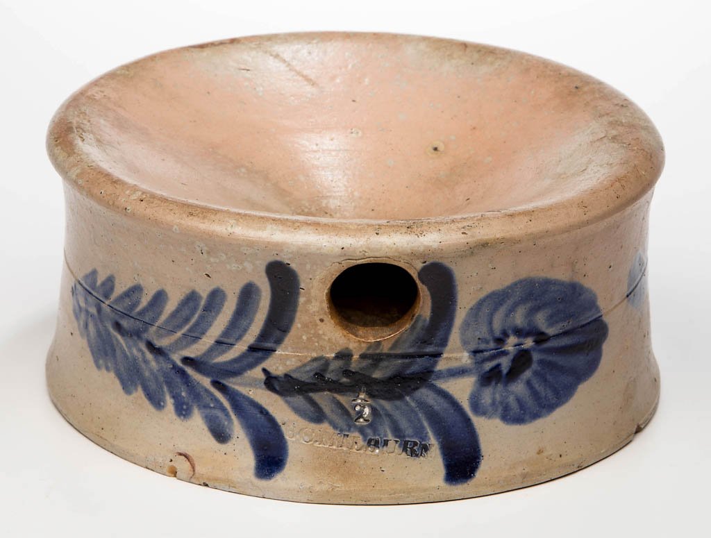 STAMPED "B C. MILBURN", ALEXANDRIA, VIRGINIA DECORATED: STAMPED "B C. MILBURN", ALEXANDRIA, VIRGINIA DECORATED STONEWARE SPITTOON, salt-glazed, "1/2" gallon capacity mark, slightly waisted form with a single incised medial ring, circular drain hole, and ro