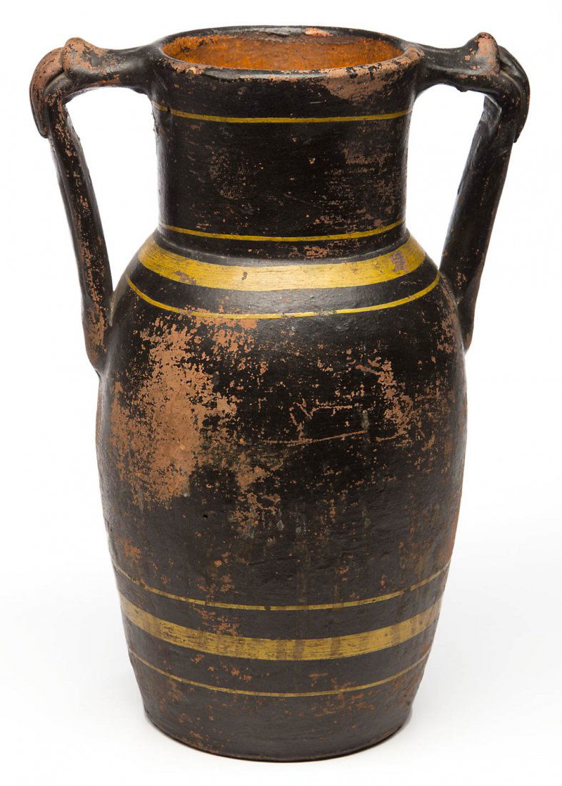 MID-ATLANTIC DECORATED EARTHENWARE / REDWARE VASE: MID-ATLANTIC DECORATED EARTHENWARE / REDWARE VASE, lead-glazed interior, unglazed exterior with original black and yellow paint, tall slightly ovoid form with cylindrical neck and angular open handles