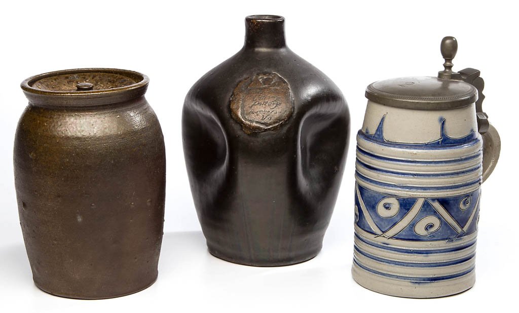 ASSORTED POTTERY ARTICLES, LOT OF THREE: ASSORTED POTTERY ARTICLES, LOT OF THREE, comprising a Jamestown, Virginia Colony art pottery small jar with cover, stamped under base, and a pinch-side flask/bottle with applied seal, and a German Wes