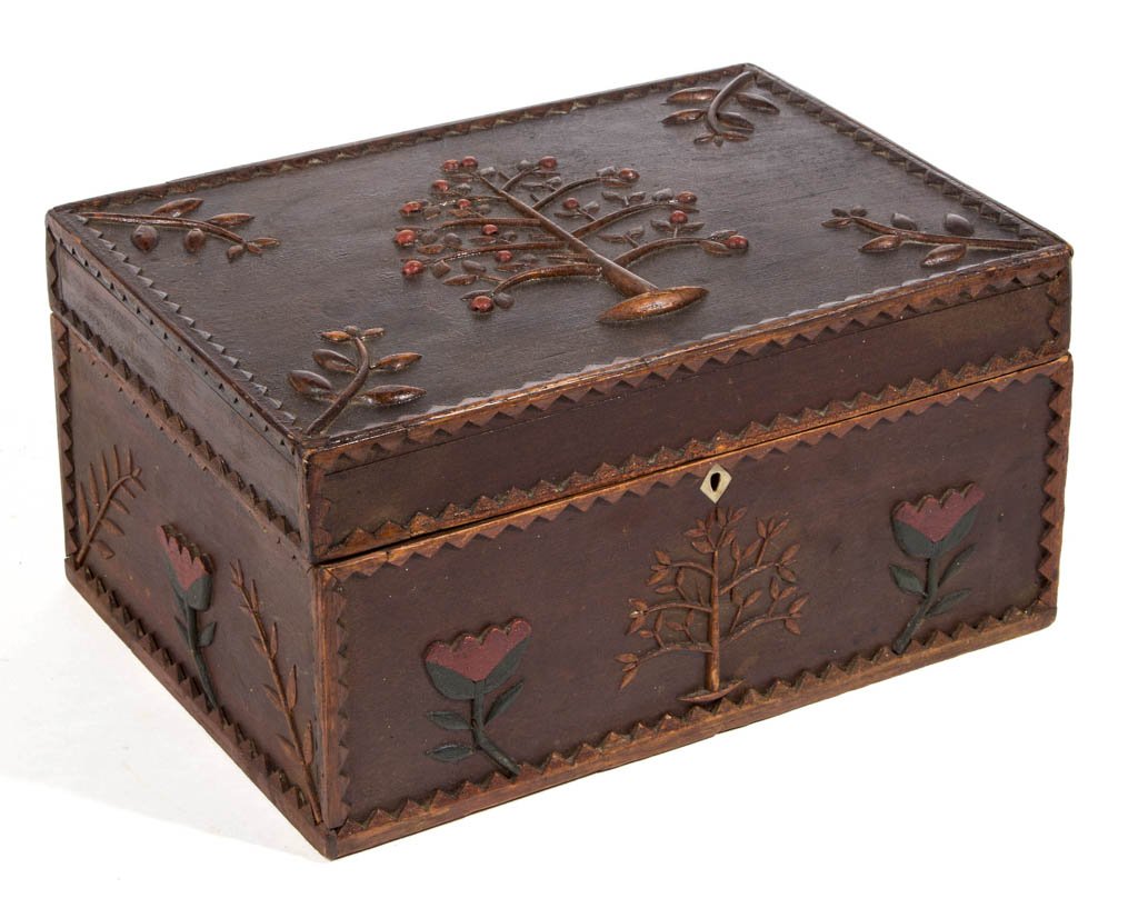 AMERICAN CARVED AND PAINT-DECORATED FOLK ART WORK BOX: AMERICAN CARVED AND PAINT-DECORATED FOLK ART WORK BOX, a fine example with a profusion of applied carved and painted elements including tulips, foliate sprays, and large central cheery tree to lid. Co