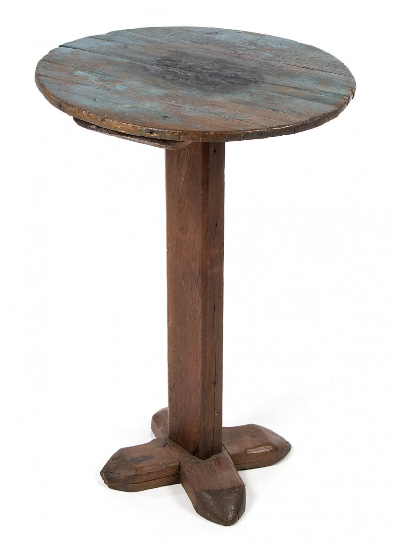SOUTHERN, POSSIBLY VIRGINIA, PRIMITIVE YELLOW PINE: SOUTHERN, POSSIBLY VIRGINIA, PRIMITIVE YELLOW PINE CANDLESTAND, the early form with circular top over a square shaft resting on an X-form base. Refinished with remnants of old blue-painted surface. 18