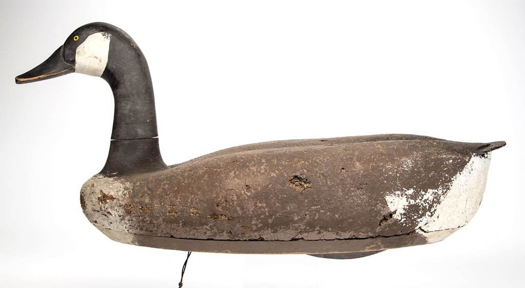 MADISON MITCHELL (MARYLAND, 20TH CENTURY) GOOSE DECOY: MADISON MITCHELL (MARYLAND, 20TH CENTURY) GOOSE DECOY, carved and painted wood with cork body. Old weight to bottom. Old working paint. First half 20th century. 11 1/4" HOA, 24 1/2" LOA. Provenance: P