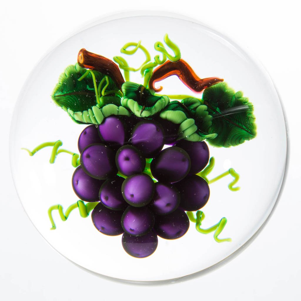 KEN ROSENFELD STUDIO ART GLASS LAMPWORK PAPERWEIGHT: KEN ROSENFELD STUDIO ART GLASS LAMPWORK PAPERWEIGHT, depicting grapes, signed and dated, signature "R" cane visible. 1996. 3 1/4" D. Provenance: From a private collection.