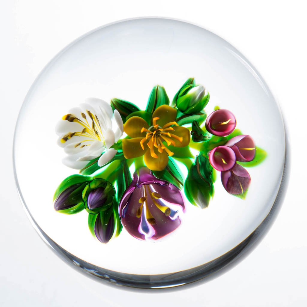 KEN ROSENFELD STUDIO ART GLASS LAMPWORK PAPERWEIGHT: KEN ROSENFELD STUDIO ART GLASS LAMPWORK PAPERWEIGHT, depicting a mixed bouquet, signed and dated, signature "R" cane visible. 1999. 3 1/4" D. Provenance: From a private collection.