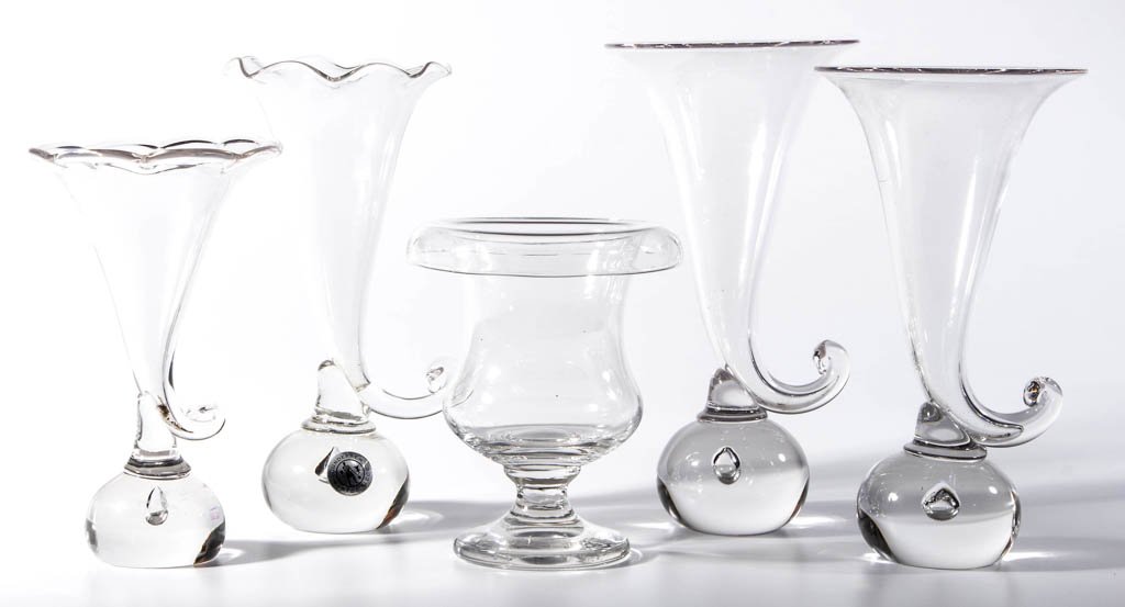 PAIRPOINT ART GLASS VASES, LOT OF FIVE: PAIRPOINT ART GLASS VASES, LOT OF FIVE, colorless, comprising four cornucopia vases with teared bases, two with scalloped rims, and an urn-form vase. Gunderson-Pairpoint Glass Works. Mid 20th century.