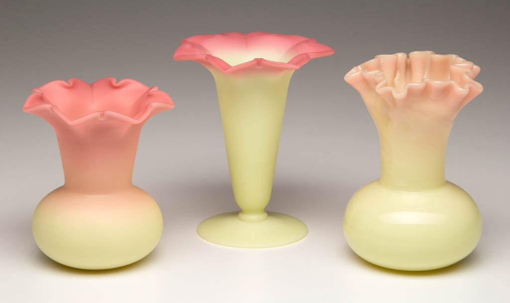 WEBB BURMESE CABINET VASES, LOT OF THREE: WEBB BURMESE CABINET VASES, LOT OF THREE, two with a plush and one with a glossy finish, each having a flared and ruffled top and polished pontil mark. Small example with acid signature under base. Th