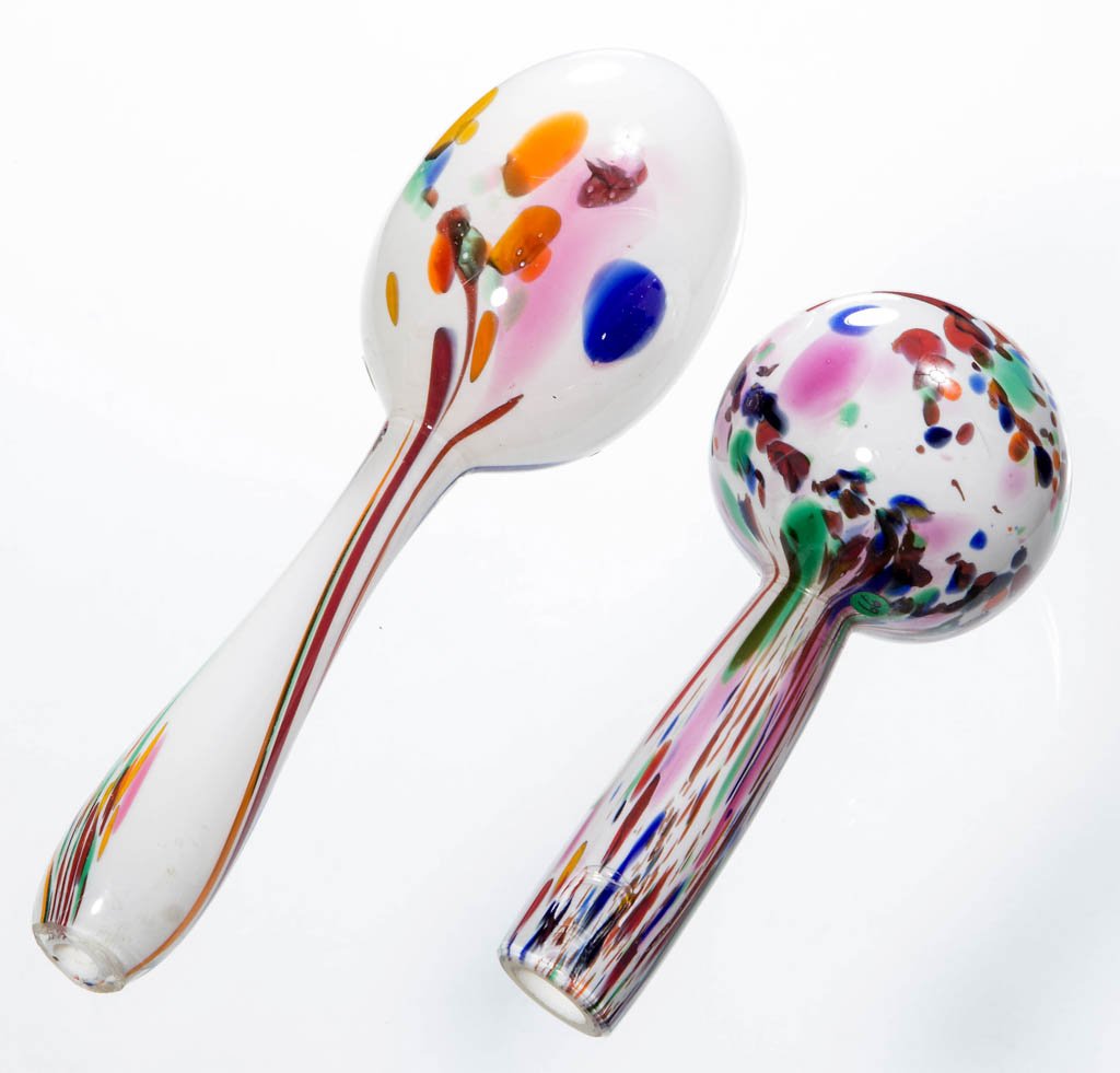 FREE-BLOWN MOTTLED GLASS DARNING BALLS, LOT OF TWO: FREE-BLOWN MOTTLED GLASS DARNING BALLS, LOT OF TWO, opal-cased colorless with rose, orange, blue, blood red, green, and yellow, comprising egg-form and globular examples, one with rough open-pontil en