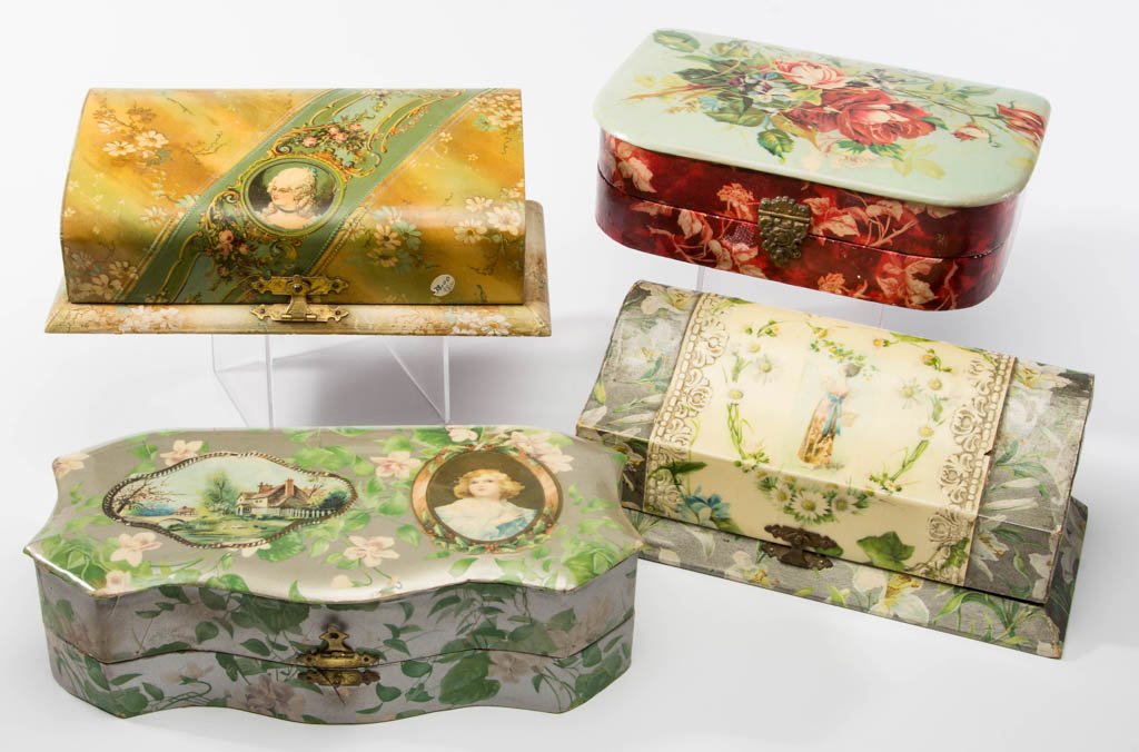 VICTORIAN CELLULOID DRESSER BOXES, LOT OF FOUR: VICTORIAN CELLULOID DRESSER BOXES, LOT OF FOUR, three depicting a figure and one roses, each with original clasp and fitted interior, also with various mirrors/brushes. Late 19th/early 20th century. 8