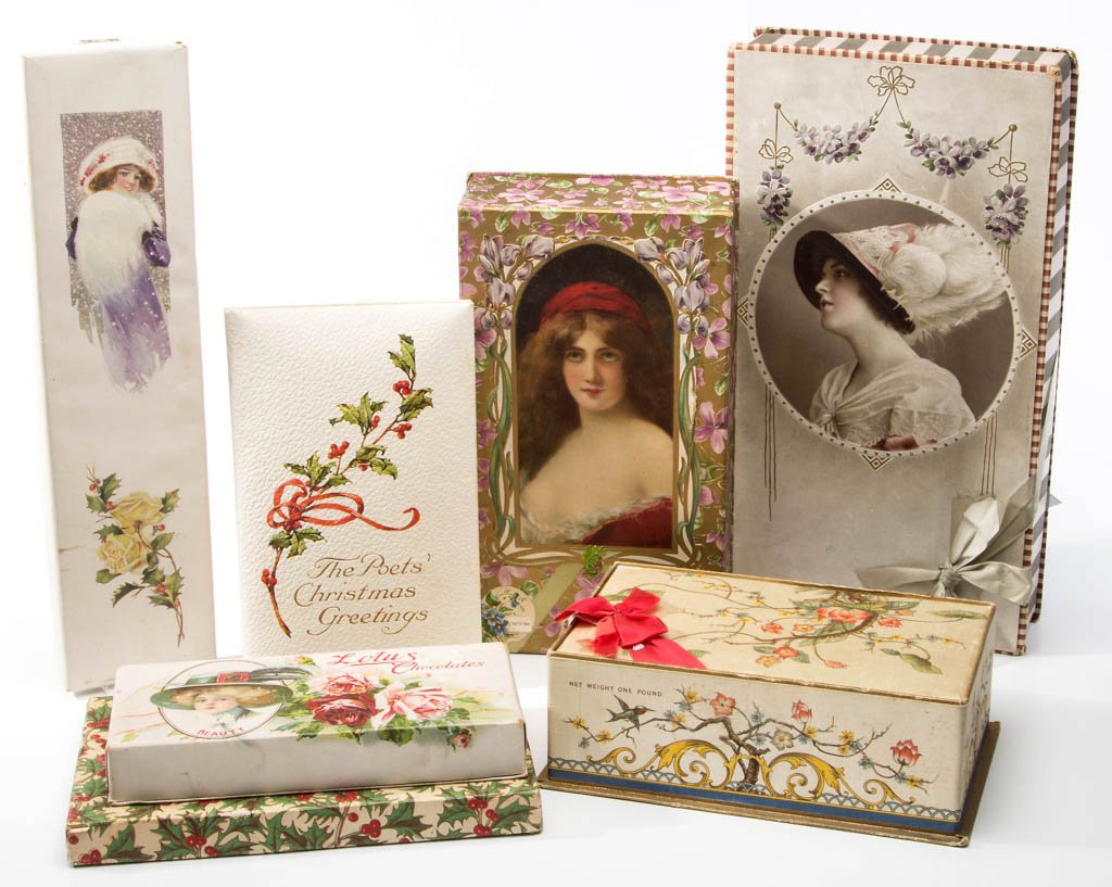 ASSORTED DECORATIVE CARDBOARD BOXES, LOT OF SIX: ASSORTED DECORATIVE CARDBOARD BOXES, LOT OF SIX, including two chocolates and one containing a Christmas book. Late 19th/first quarter 20th century. Largest 13" x 8". Provenance: Nadene J. Stockard Es