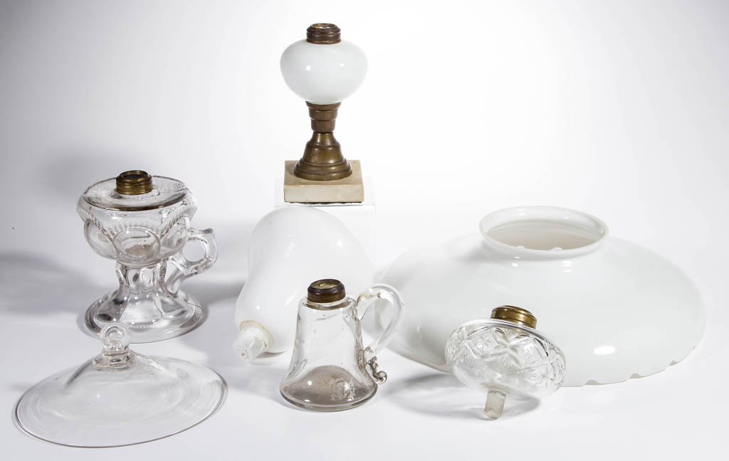 ASSORTED LIGHTING RELATED ARTICLES, LOT OF SEVEN: ASSORTED LIGHTING RELATED ARTICLES, LOT OF SEVEN, including two finger lamps and a free-blown smoke bell. 19th and 20th century. Smoke bell 7" D. Provenance: Property of Art & Kathy Green.