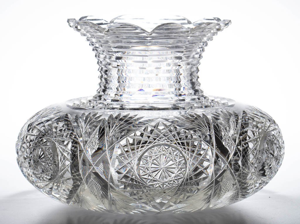 J. HOARE & CO. "MONARCH" BRILLIANT CUT GLASS FLOWER: J. HOARE & CO. "MONARCH" BRILLIANT CUT GLASS FLOWER CENTER VASE, colorless, compressed form, ten large flared scallop rim over horizontal stepping, six large hobstars with fans, cross-hatching, and ho