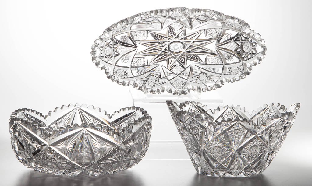 T. G. HAWKES & CO. BRILLIANT CUT GLASS TABLE ARTICLES,: T. G. HAWKES & CO. BRILLIANT CUT GLASS TABLE ARTICLES, LOT OF THREE, colorless, comprising a circular-form and a tapered ovoid-form bowl, and an Albion relish/celery tray, each with scallop and sawtoo