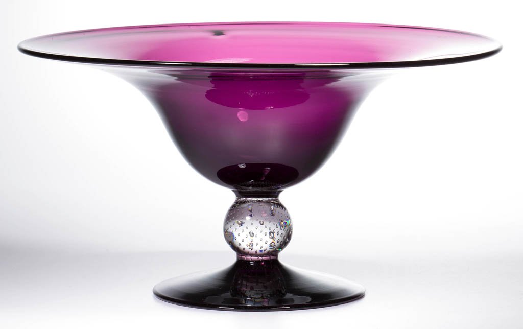 PAIRPOINT CONTROLLED-BUBBLE BOWL: PAIRPOINT CONTROLLED-BUBBLE BOWL, deep amethyst, shape B-369, having an applied foot and controlled-bubble stem, polished pontil mark. Pairpoint Manufacturing Company. First half 20th century. 6 1/4" 