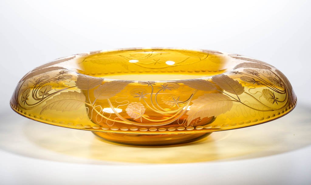 PAIRPOINT ENGRAVED CENTER-PIECE BOWL: PAIRPOINT ENGRAVED CENTER-PIECE BOWL, Auroria, #A-106 shape with engraved Fruits, Nuts, and Berries pattern, polished pontil mark. 15 1/8" D. Literature: Parallels Frost - The Essence of Pairpoint, p.