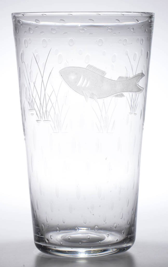 THOMAS WEBB CUT AND ENGRAVED GLASS VASE: THOMAS WEBB CUT AND ENGRAVED GLASS VASE, colorless, slightly tapered cylinder form, depicting a frosted fish within the water with scattered bubbles and medial foliage, polished pontil mark. Acid-etch