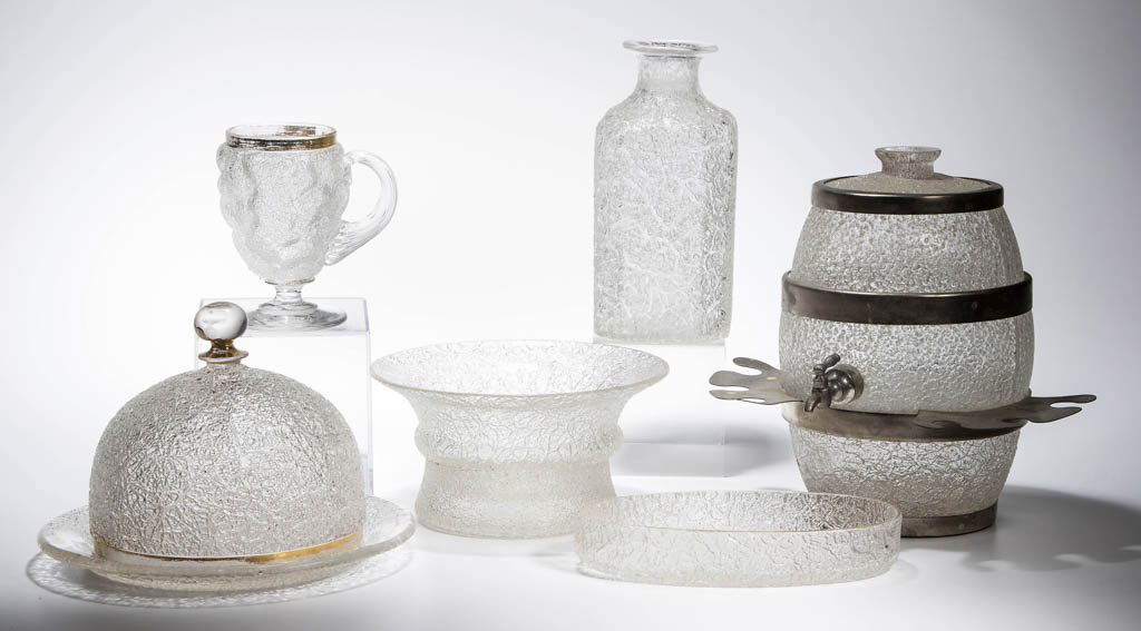 OVERSHOT TABLE ARTICLES, LOT OF SIX: OVERSHOT TABLE ARTICLES, LOT OF SIX, colorless, five with traces of gilt, including a dish with drain holes in base and original under dish, a butter dish, and a barrel-form dispenser. Boston & Sandwi