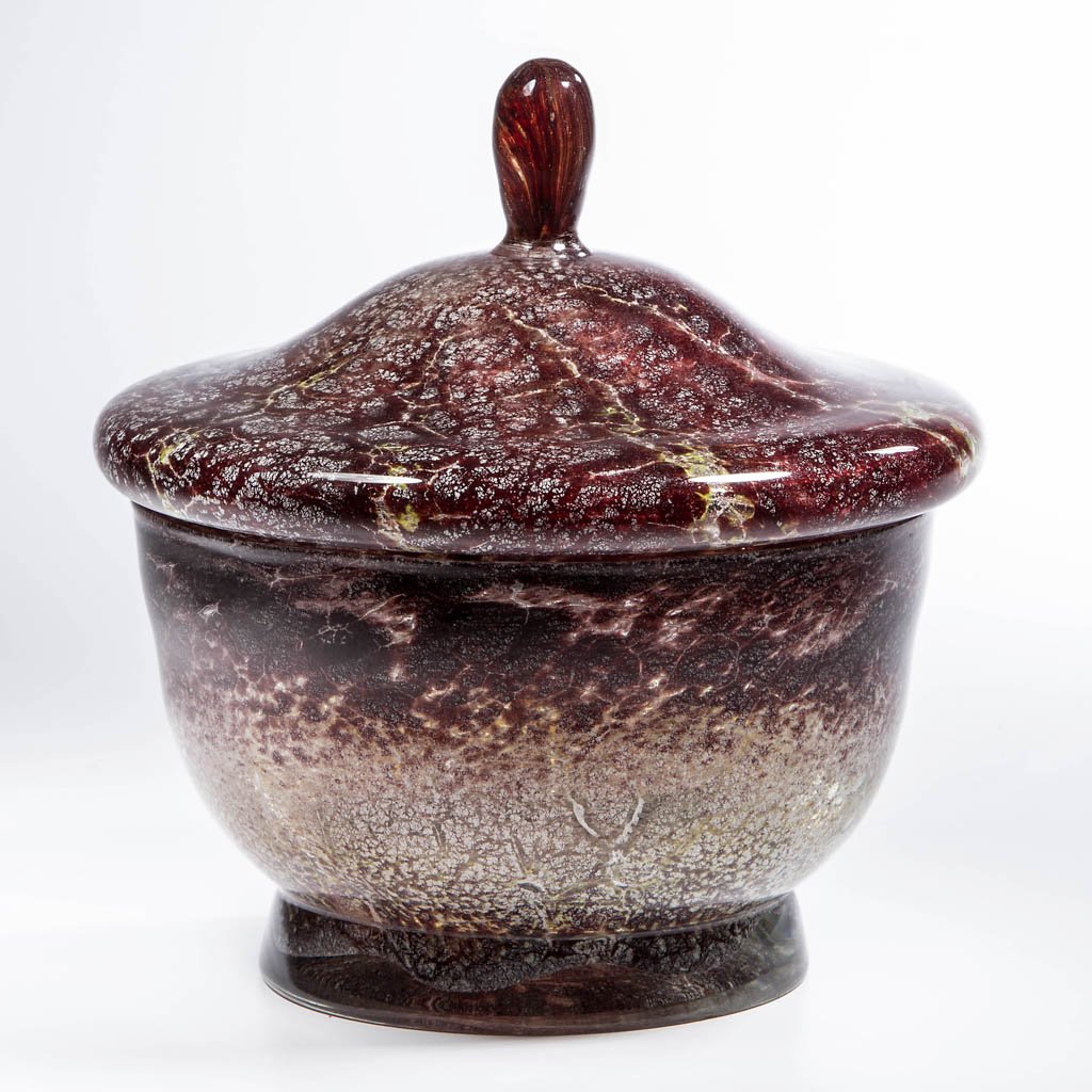 EUROPEAN ART GLASS COVERED FOOTED BOWL: EUROPEAN ART GLASS COVERED FOOTED BOWL, cased with mottled red/brown to lime green, circular form, factory polished cover rim, foot and pontil mark. Unknown maker. First half 20th century. 7 1/8" HOA,