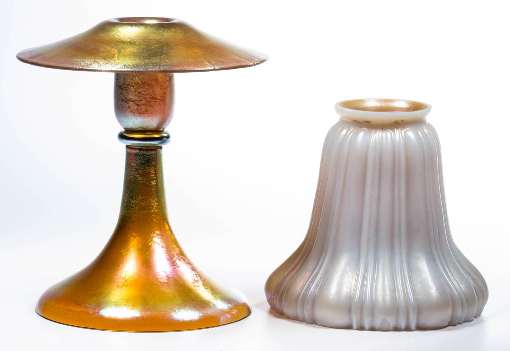 STEUBEN ART GLASS ARTICLES, LOT OF TWO: STEUBEN ART GLASS ARTICLES, LOT OF TWO, calcite and golden Aurene, comprising a signed Steuben calcite shade and an unsigned golden iridescent candleholder. Steuben Glass Works and possibly others. Fi