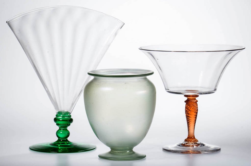 STEUBEN ART GLASS ARTICLES, LOT OF THREE: STEUBEN ART GLASS ARTICLES, LOT OF THREE, comprising an Aquamarine urn-form vase, a signed Rosa stemmed shrimp bowl, and a signed green footed fan vase, each with polished pontil marks. Steuben Glass