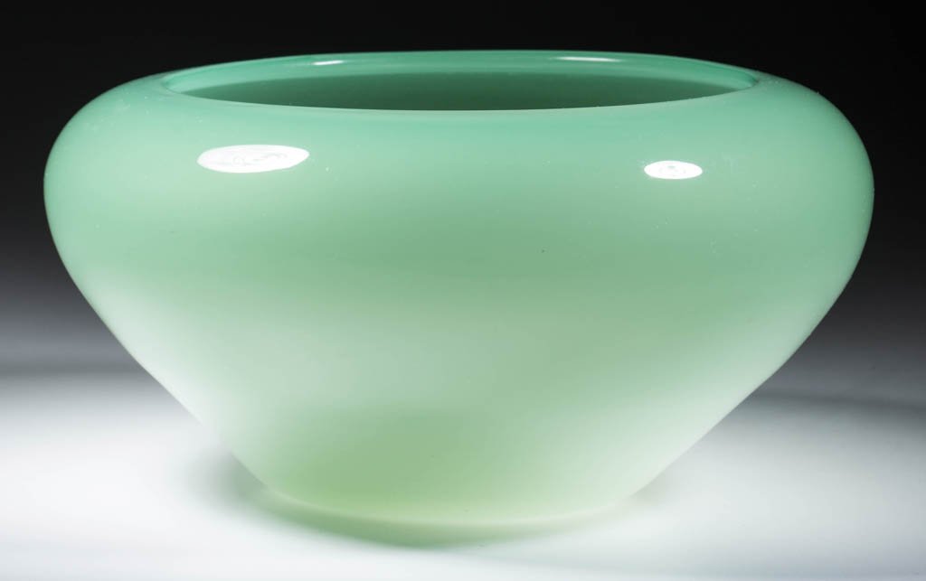 STEUBEN ART GLASS CENTERPIECE BOWL: STEUBEN ART GLASS CENTERPIECE BOWL, Green Jade, having a polished pontil mark, unsigned. Steuben Glass Works. Circa 1920-1930. 5 1/4" H, 10 1/4" D. Provenance: From the collection of Thomas Dimitroff.