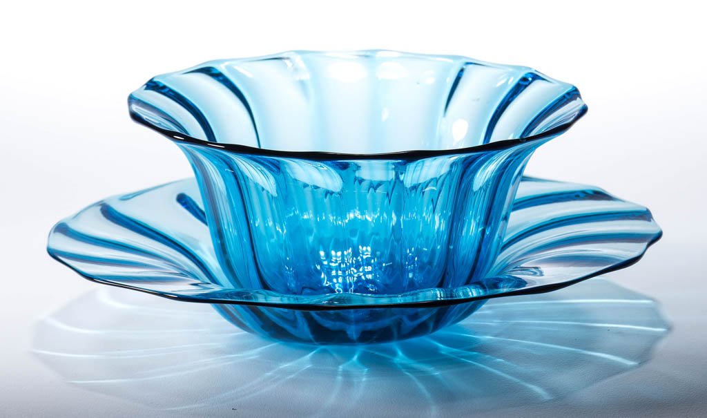 STEUBEN ART GLASS BOWL AND UNDERPLATE: STEUBEN ART GLASS BOWL AND UNDERPLATE, Celeste Blue, shape 2680, both with ribbed panels, bowl with polished pontil mark, plate with polished base. Steuben Glass Works. Circa 1920-1930. Bowl 2 1/8" DO