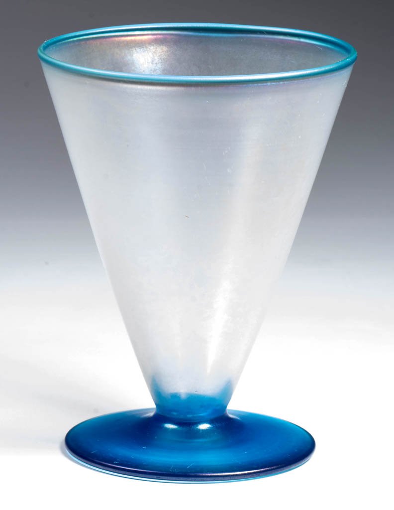 STEUBEN ART GLASS VERRE DE SOIE CONICAL GOBLET: STEUBEN ART GLASS VERRE DE SOIE CONICAL GOBLET, colorless and blue, having an applied foot and Celeste Blue rim, polished pontil mark. Steuben Glass Works. First quarter 20th century. 4 7/8" H.