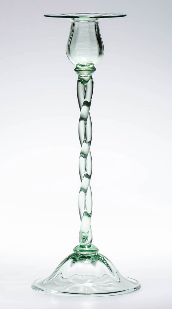 ART GLASS OPTIC CANDLESTICK: ART GLASS OPTIC CANDLESTICK, green, having an applied domed foot with polished pontil mark, twisted stem and applied candle holder. Spurious Tiffany Studios signature. Possibly Steuben Glass Works or