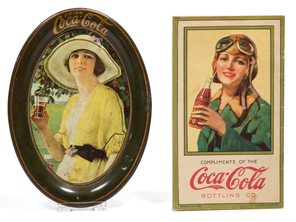 COCA-COLA TIN ADVERTISING TIP TRAY: COCA-COLA TIN ADVERTISING TIP TRAY, featuring a smiling woman in yellow dress with glass raised. Together with a small booklet titled "We: The Story of Achievement in Aviation" and containing a Coca-C
