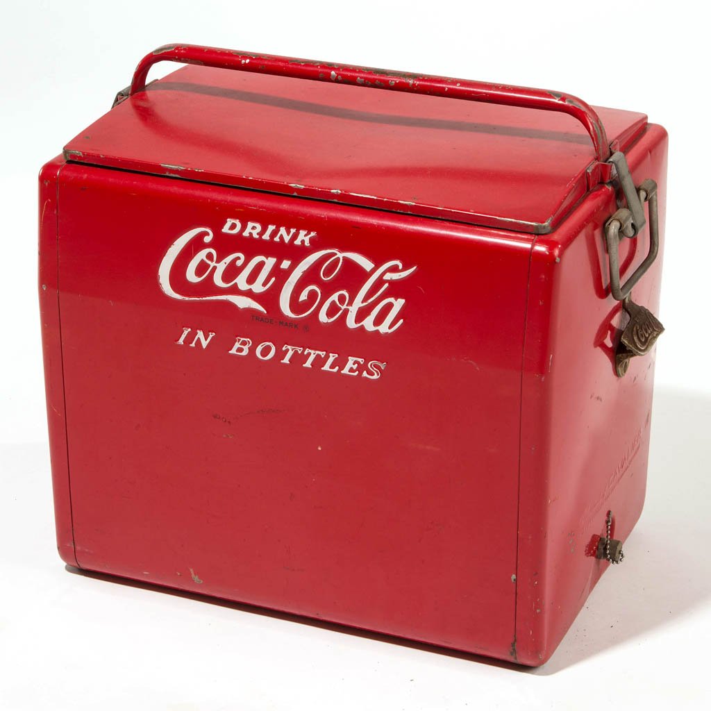 COCA-COLA METAL ADVERTISING COOLER: COCA-COLA METAL ADVERTISING COOLER, in red paint with white lettering and marked for Cavalier Corporation, Chattanooga, Tennessee. Mid 20th century. 18" HOA, 18" W, 13" D. Provenance: Property of a Vi