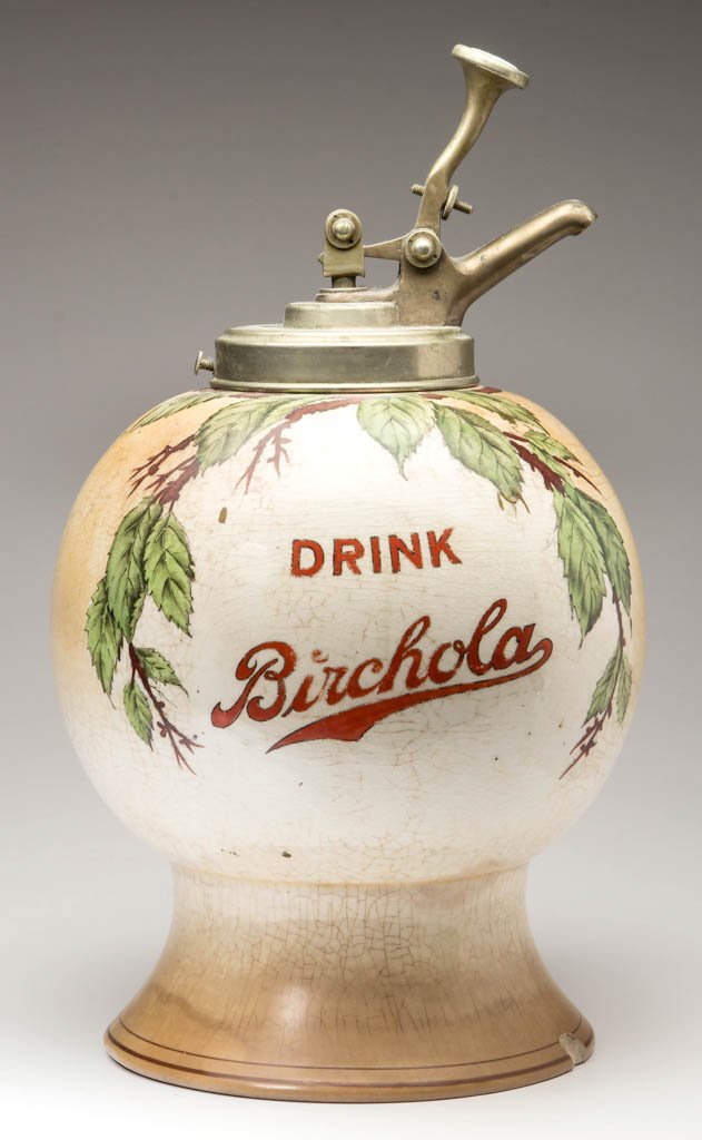 BIRCHOLA CERAMIC SYRUP DISPENSER: BIRCHOLA CERAMIC SYRUP DISPENSER, of globular form with flared foot and birch leaf decoration. Likely associated period pump. Base marked for "Birchola Co., Dickson City, PA". Early 20th century. 15 3